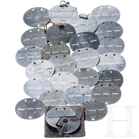 A collection of 25 Heer and Luftwaffe military ID discs - photo 1 A collection of 25 Heer and Luftwaffe military ID discs - photo 1