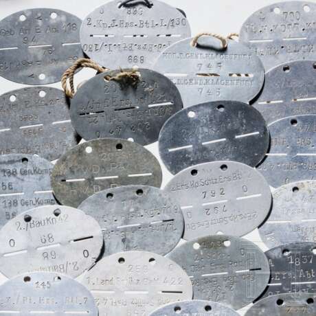 A collection of 25 Heer and Luftwaffe military ID discs - photo 2 A collection of 25 Heer and Luftwaffe military ID discs - photo 2