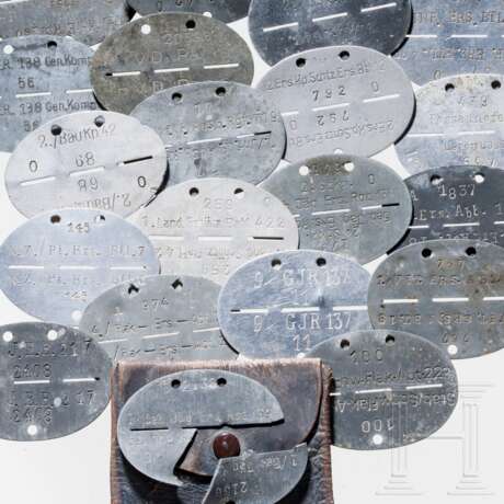 A collection of 25 Heer and Luftwaffe military ID discs - photo 3 A collection of 25 Heer and Luftwaffe military ID discs - photo 3