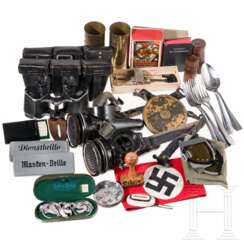 A collection of equipment, trench art, armband, Hausser card game, binoculars, etc.