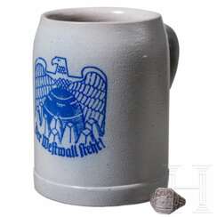 A commemorative beer mug "Der Westwall steht!" and a Westwall silver ring
