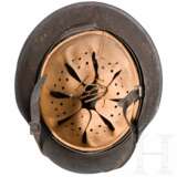 A fire brigade steel helmet M34, two Heer steel helmets M35 and M42 - photo 2