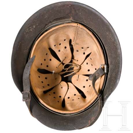 A fire brigade steel helmet M34, two Heer steel helmets M35 and M42 - фото 2 A fire brigade steel helmet M34, two Heer steel helmets M35 and M42 - фото 2