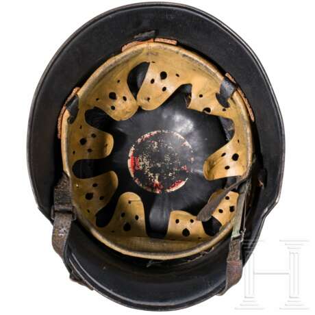 A fire brigade steel helmet M34, two Heer steel helmets M35 and M42 - фото 4 A fire brigade steel helmet M34, two Heer steel helmets M35 and M42 - фото 4