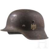 An army steel helmet M 42 with single decal - фото 1