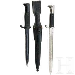 Two bayonets with term of service etching