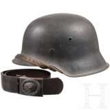 A Luftwaffe steel helmet M 42 and a belt - photo 1