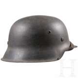 A Luftwaffe steel helmet M 42 and a belt - photo 2