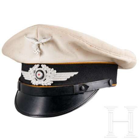 A Luftwaffe flying troops EM/NCO's summer visor cap - photo 1 A Luftwaffe flying troops EM/NCO's summer visor cap - photo 1