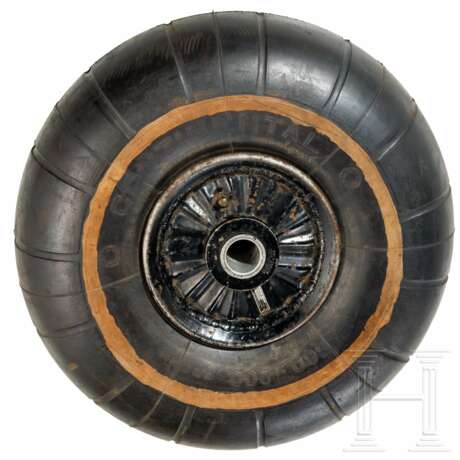 A tail wheel of an airplane - photo 1 A tail wheel of an airplane - photo 1