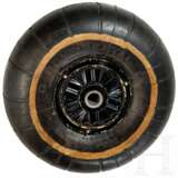 A tail wheel of an airplane - photo 2