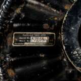 A tail wheel of an airplane - photo 3