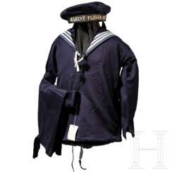 A sailor's dress for a child as a naval aviator