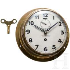 A civilian ship's wall clock made by Friedrich Leutert K.G., Erbsdorf near Lüneburg