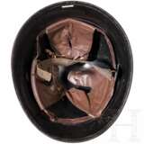 A Dutch M 34 steel helmet used by the police - фото 3