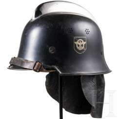 A helmet M 34 of the fire department/fire police with double decal