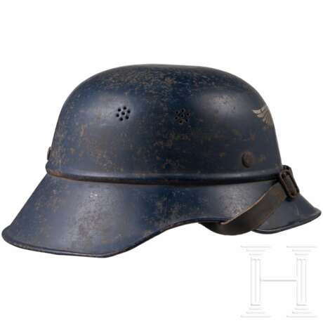 A Fire Protection Police double decal helmet M38 and a Reichsluftschutzbund helmet - photo 2 A Fire Protection Police double decal helmet M38 and a Reichsluftschutzbund helmet - photo 2