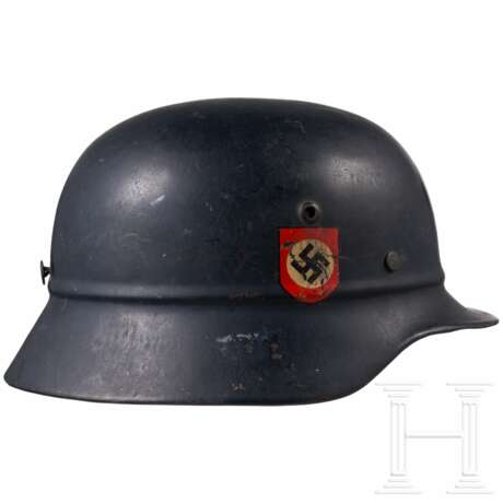 A Fire Protection Police double decal helmet M38 and a Reichsluftschutzbund helmet - photo 3 A Fire Protection Police double decal helmet M38 and a Reichsluftschutzbund helmet - photo 3