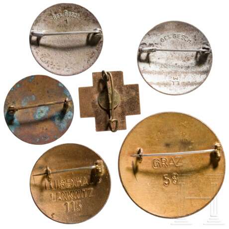 A collection of German Red Cross badges and a donation can - photo 4