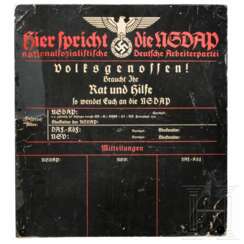 A wall plaque "Hier spricht die NSDAP"