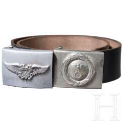 A Luftschutzwarndienst and a DLV belt buckle with belt