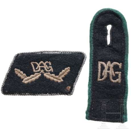 A group of cloth insignia for members of the DAG company security service - photo 1 A group of cloth insignia for members of the DAG company security service - photo 1