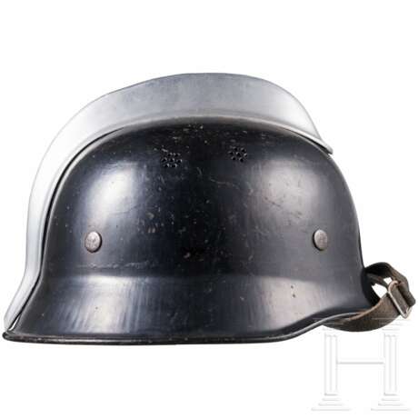 A Fire Brigade helmet M 34 for a member of the WiFo - photo 2 A Fire Brigade helmet M 34 for a member of the WiFo - photo 2