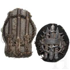 Two cap badges for the battalion "Onore et Sacrificio"