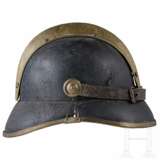 A visor cap and five helmets of the fire fighters - photo 2