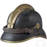 A visor cap and five helmets of the fire fighters - photo 15