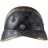 A visor cap and five helmets of the fire fighters - photo 17