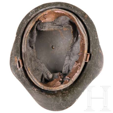 A steel helmet SSH-36 with winter camouflage - фото 3 A steel helmet SSH-36 with winter camouflage - фото 3