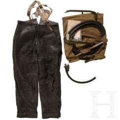 A repair kit, work trousers and instructions, 20th century