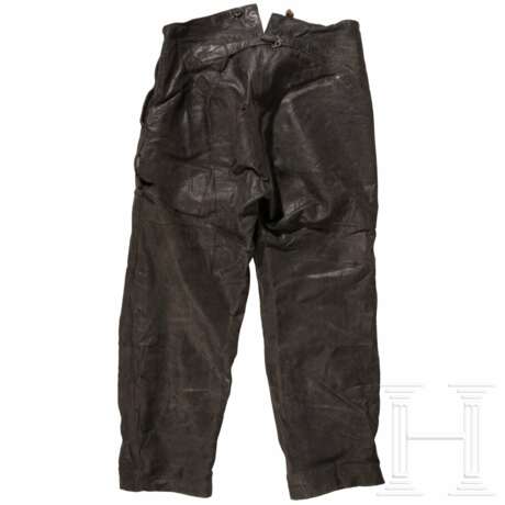 A repair kit, work trousers and instructions, 20th century - Foto 2 A repair kit, work trousers and instructions, 20th century - Foto 2