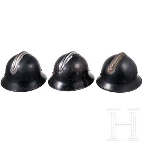 Three firefighters' helmets - photo 6