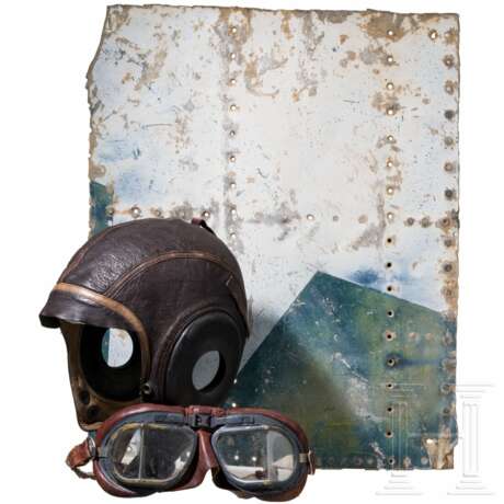A US Air Force flying helmet, a pair of Royal Air Force pilot goggles and a part of an aircraft fuselage - photo 1 A US Air Force flying helmet, a pair of Royal Air Force pilot goggles and a part of an aircraft fuselage - photo 1