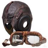 A US Air Force flying helmet, a pair of Royal Air Force pilot goggles and a part of an aircraft fuselage - photo 3
