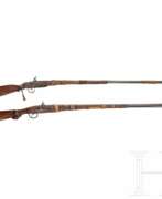 Страны и континенты. Zwei afrikanische Vorderladergewehre, um 1850.