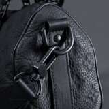 Louis Vuitton "Keepall 25" Tasche in schwarzem Tau… - Foto 2