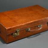 Large brown vintage leather suitcase with embossed… - фото 1