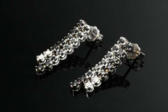 Pair of white gold 750 earrings made of movable ri… - photo 1 Pair of white gold 750 earrings made of movable ri… - photo 1