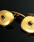 Product catalog. Pair of oval hammered 585 yellow gold cufflinks wi…