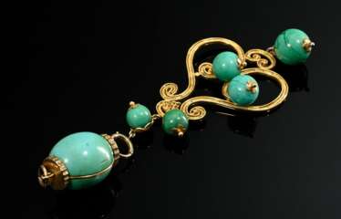 2 pieces of jewellery: decorative 750 yellow gold …