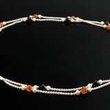 2 assorted cultured pearl necklaces with black ony… - photo 1