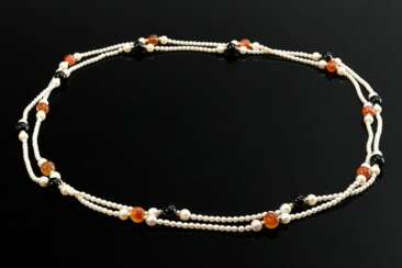 2 assorted cultured pearl necklaces with black ony…