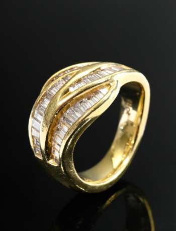 750 yellow gold ring with baguette diamonds (total… - photo 1