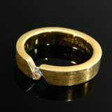 Bunz 750 yellow gold tension ring in a simple desi… - photo 2