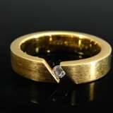 Bunz 750 yellow gold tension ring in a simple desi… - photo 3