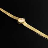 Small Omega yellow gold 750 ladies' wristwatch, ma… - фото 4