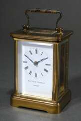 English travel clock in brass case with glass on a…